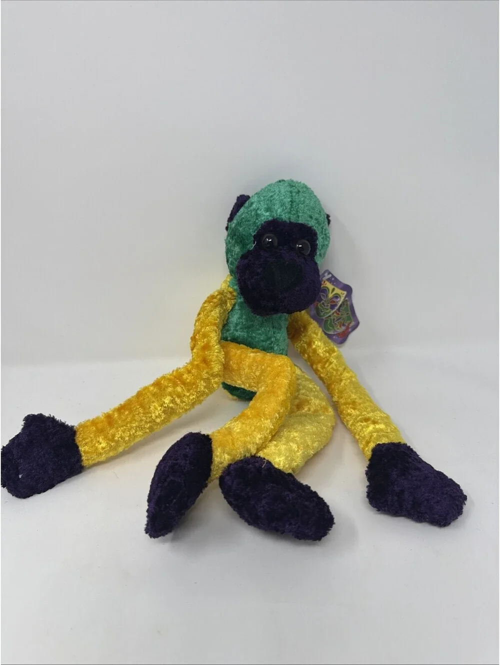 Multi Colored Mardi Gras Monkey Plush